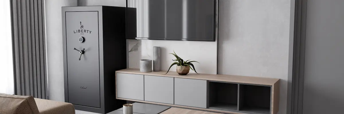 Liberty Colonial gun safe in a modern living room featuring a premium matte gray finish and contemporary home design