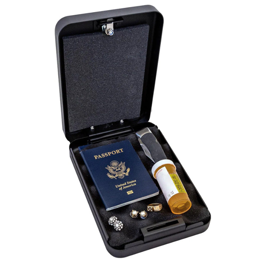 Liberty Safe HDV-50 Handgun Vault, open with medications, jewelry and passport.