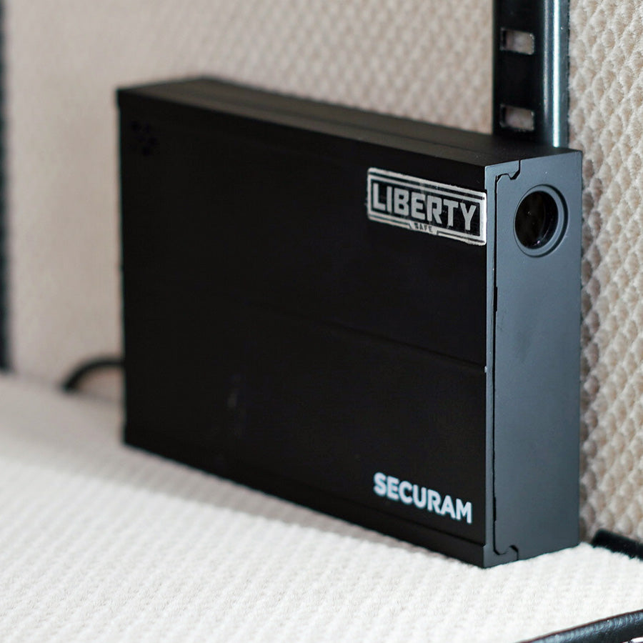 Liberty SafElert Securam Safe Monitor in a safe interior.